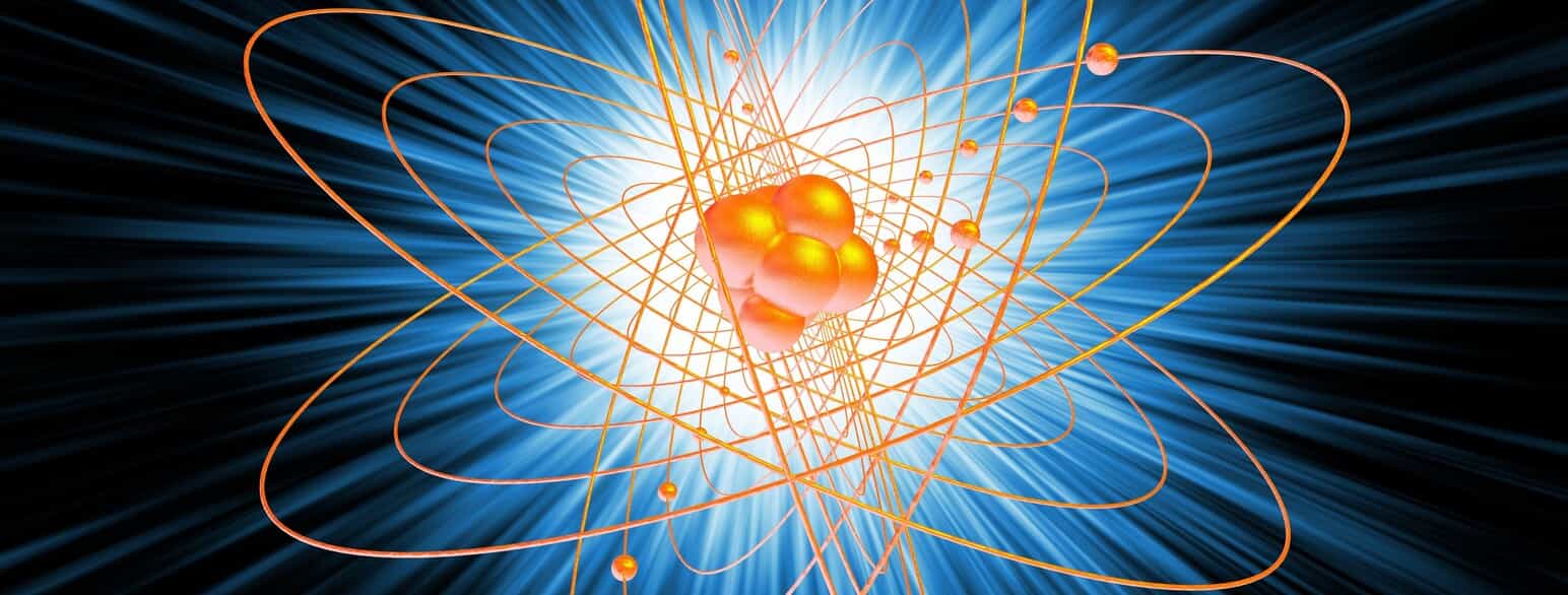 Illustration af atomkerne omkredset af elektroner