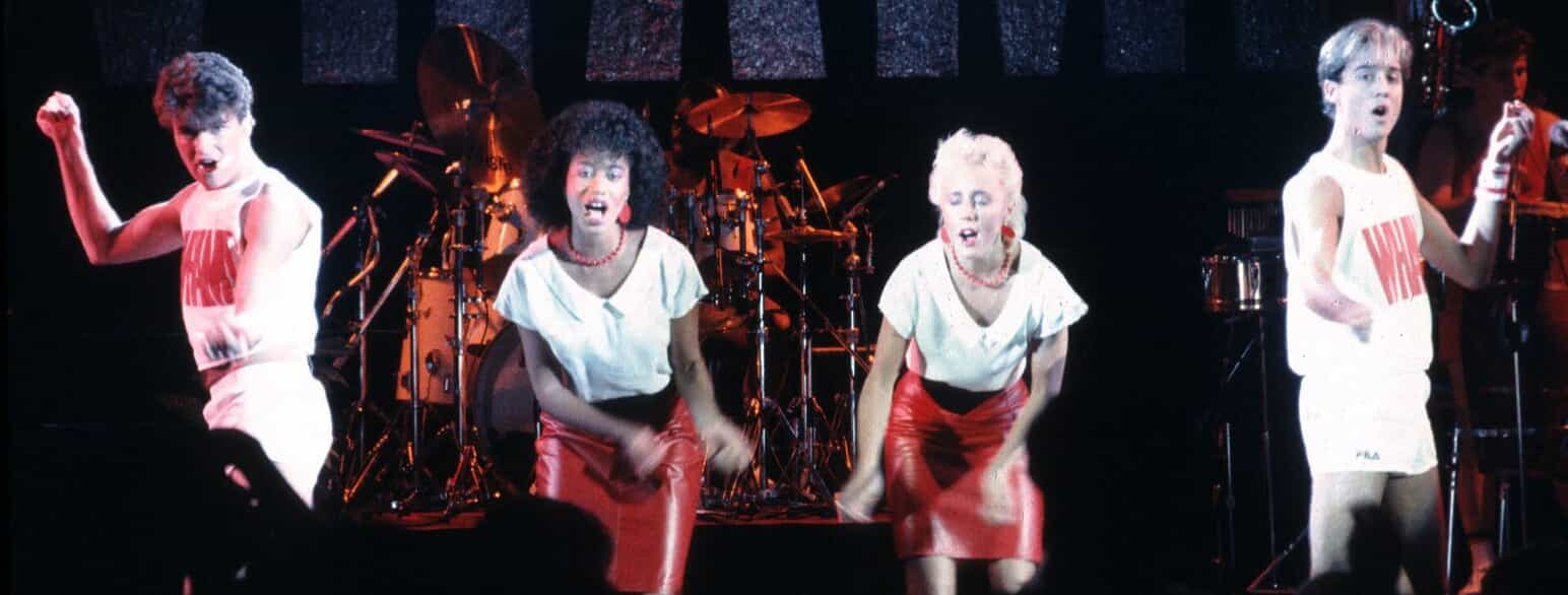Wham! under en koncert i 1983.